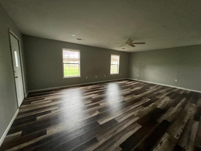 12326 Renshaw Ln, Trumann, AR 72401 - unfurnished room featuring dark wood finished floors, baseboards, and ceiling fan