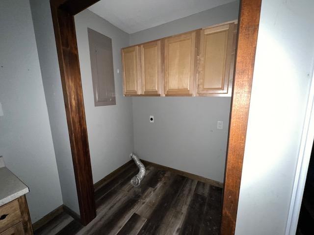 12326 Renshaw Ln, Trumann, AR 72401 - clothes washing area featuring dark wood-style floors, hookup for an electric dryer, cabinet space, and electric panel