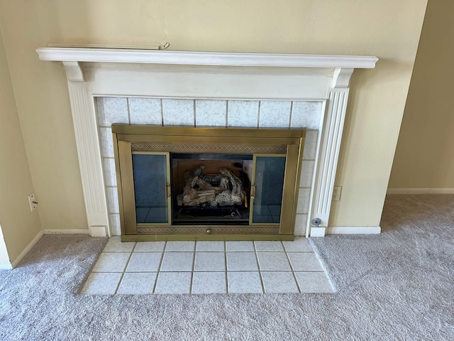 142 Lake Hamilton Dr Unit 204, Hot Springs, AR 71913 - interior details with baseboards, a tile fireplace, and carpet