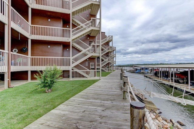 142 Lake Hamilton Dr Unit 204, Hot Springs, AR 71913 - exterior space featuring a lawn, a boat dock, and a water view