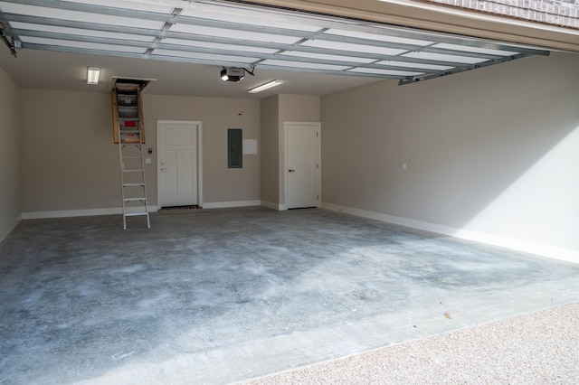garage featuring a garage door opener and electric panel