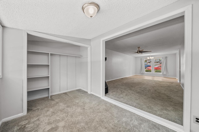 73 Perralena Way, Hot Springs Village, AR 71909 - interior space featuring a ceiling fan and carpet floors