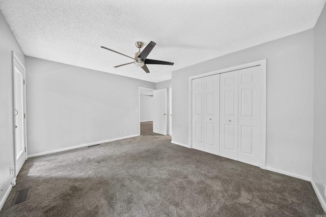 73 Perralena Way, Hot Springs Village, AR 71909 - unfurnished bedroom featuring carpet floors, a closet, baseboards, visible vents, and a textured ceiling