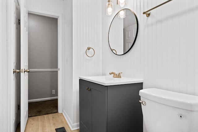 73 Perralena Way, Hot Springs Village, AR 71909 - half bath with visible vents, baseboards, toilet, wood finished floors, and vanity