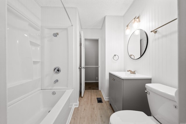 73 Perralena Way, Hot Springs Village, AR 71909 - full bath featuring wood finished floors, toilet, shower / tub combination, vanity, and visible vents