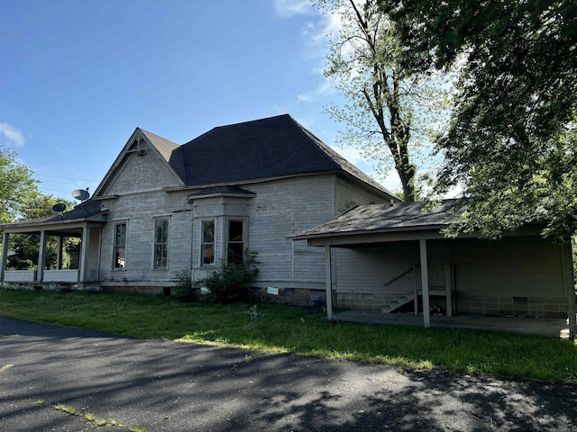 307 E Center Ave, Searcy, AR 72143 - view of side of home featuring a yard