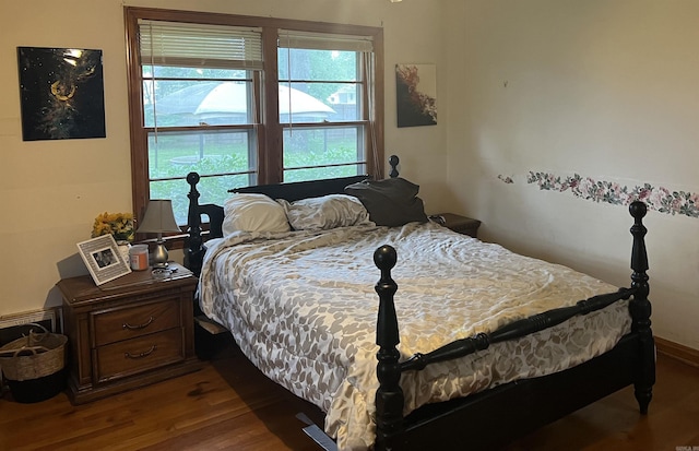190 E Poplar St, Piggott, AR 72454 - bedroom with wood finished floors
