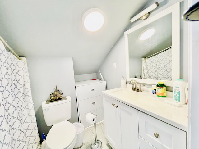 bathroom featuring toilet, marble finish floor, and vanity