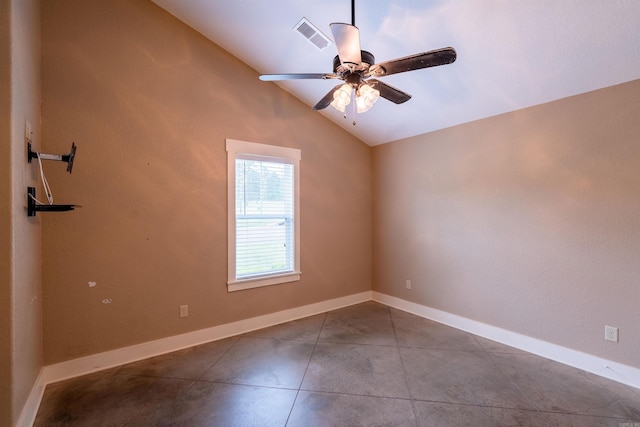 unfurnished room with ceiling fan, baseboards, vaulted ceiling, and visible vents