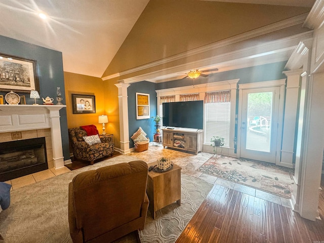 7 Samantha Cir, Searcy, AR 72143 - living area featuring ceiling fan, wood-type flooring, a tile fireplace, vaulted ceiling, and ornate columns