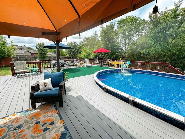7 Samantha Cir, Searcy, AR 72143 - pool featuring fence, a deck, and outdoor dining area