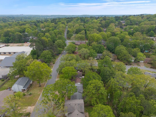aerial view featuring a residential view and a wooded view