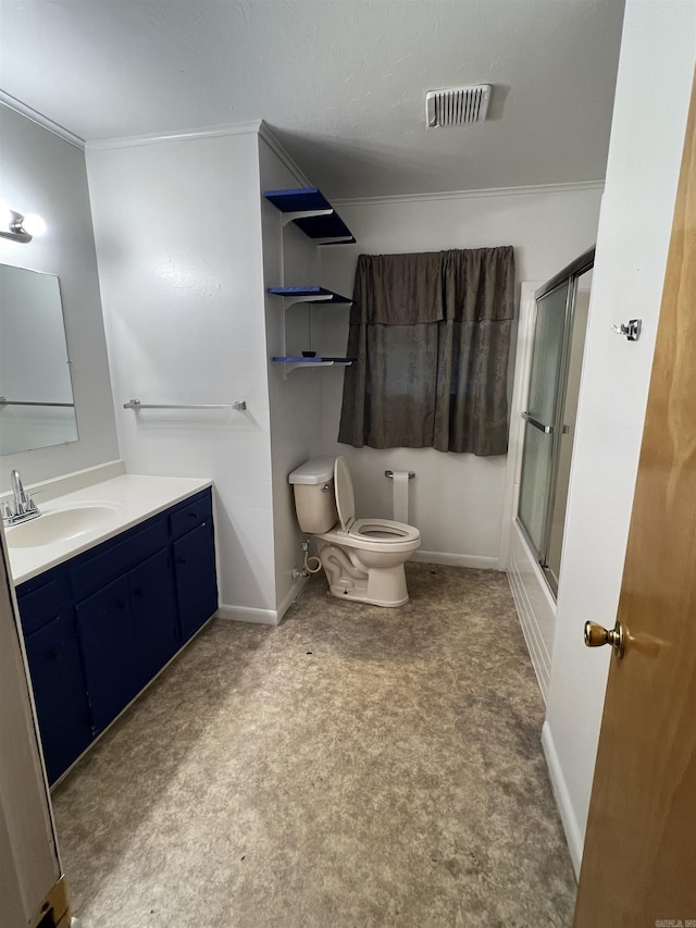 904 Belmont Dr, Pine Bluff, AR 71601 - bathroom featuring combined bath / shower with glass door, toilet, vanity, baseboards, and visible vents