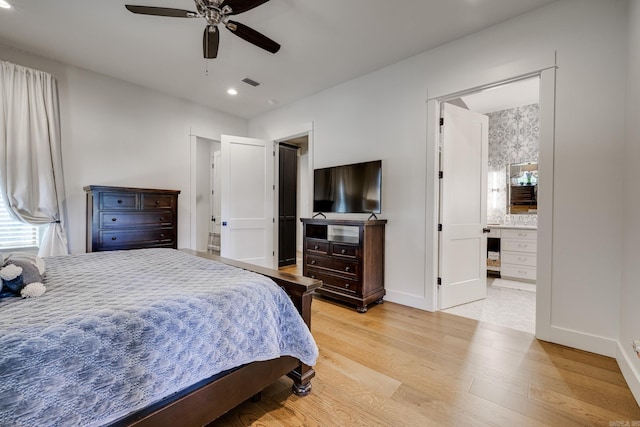 bedroom with light wood-style floors, recessed lighting, visible vents, and baseboards