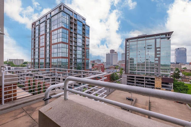 balcony featuring a city view