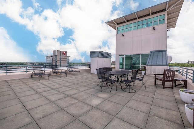 view of patio featuring outdoor dining area