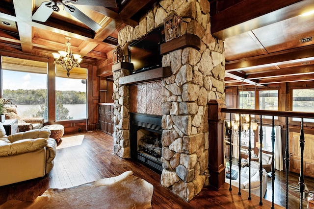 living area featuring coffered ceiling, beam ceiling, and wood ceiling