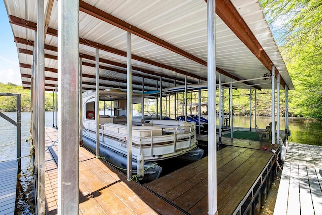 dock area featuring a water view and boat lift