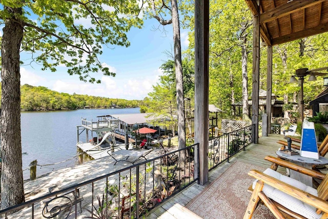 balcony featuring a water view