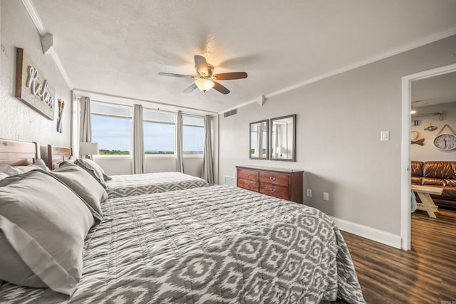 740 Weston Unit 810, Hot Springs, AR 71913 - bedroom with dark wood-type flooring, baseboards, visible vents, and crown molding