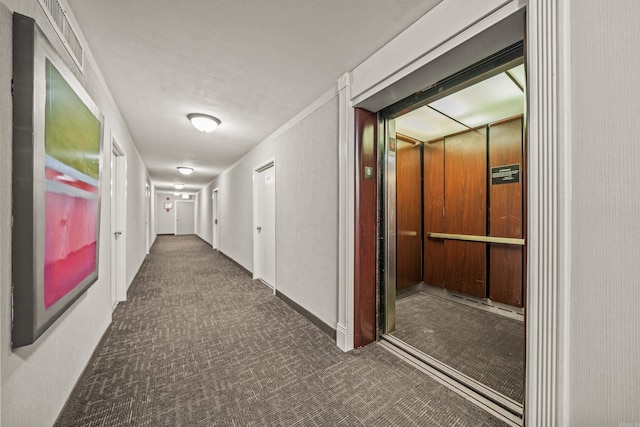 740 Weston Unit 810, Hot Springs, AR 71913 - hall featuring elevator, visible vents, carpet, and baseboards