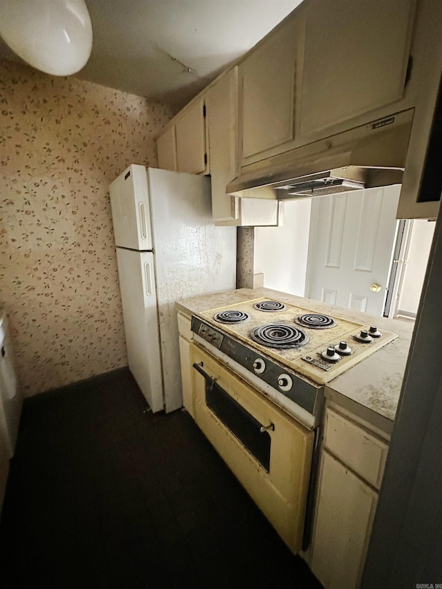 1919 Georgia Unit 7, Little Rock, AR 72207 - kitchen featuring stovetop, under cabinet range hood, and light countertops