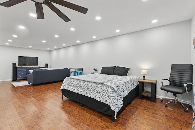 bedroom with baseboards, a ceiling fan, recessed lighting, and wood finished floors