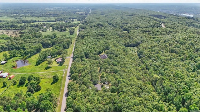 aerial view featuring a view of trees