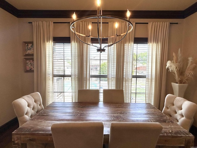 dining area featuring a chandelier