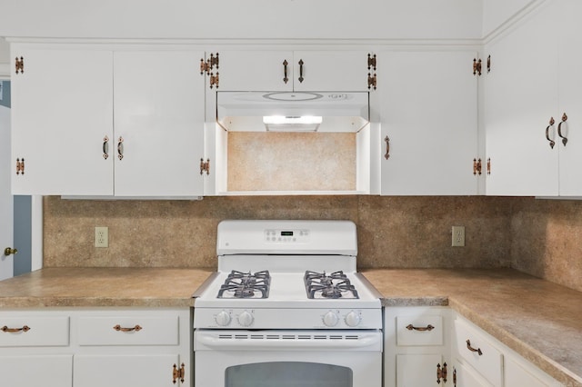 kitchen featuring white cabinetry, white range with gas cooktop, under cabinet range hood, and light countertops
