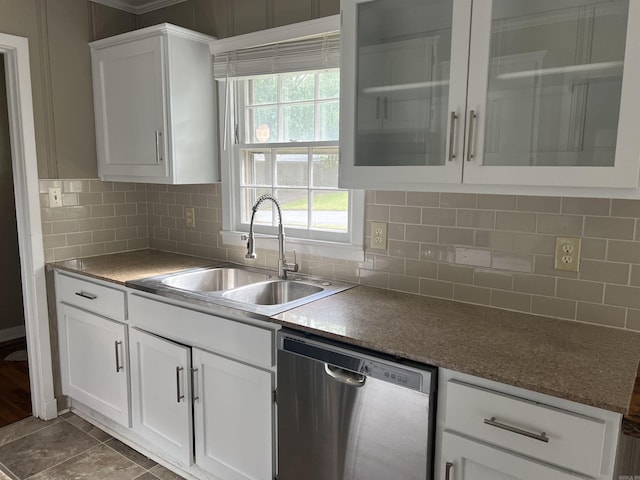 kitchen featuring white cabinetry, dishwasher, glass insert cabinets, and a sink