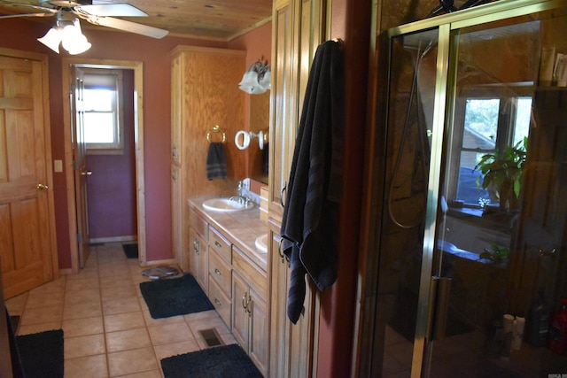 12192 Point Breeze Rd, Parks, AR 72950 - full bath featuring tile patterned flooring, visible vents, vanity, a shower stall, and a ceiling fan