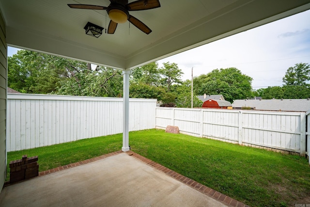 view of patio featuring a ceiling fan and a fenced backyard