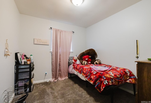 carpeted bedroom with baseboards