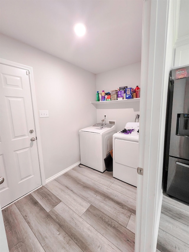 505 E Mississippi St, Beebe, AR 72012 - washroom featuring washer and clothes dryer and light wood finished floors