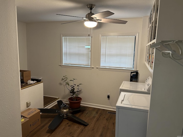 washroom featuring independent washer and dryer, a ceiling fan, laundry area, and dark wood-style floors