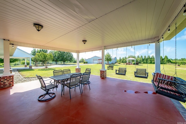 view of patio featuring a gazebo and outdoor dining area