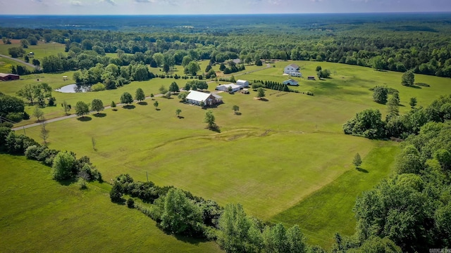 bird's eye view with a rural view and a wooded view