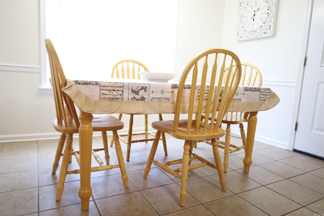3302 Willow Ln, Paragould, AR 72450 - dining space featuring baseboards and tile patterned floors