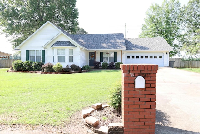 3302 Willow Ln, Paragould, AR 72450 - ranch-style home featuring fence, roof with shingles, an attached garage, a front yard, and concrete driveway