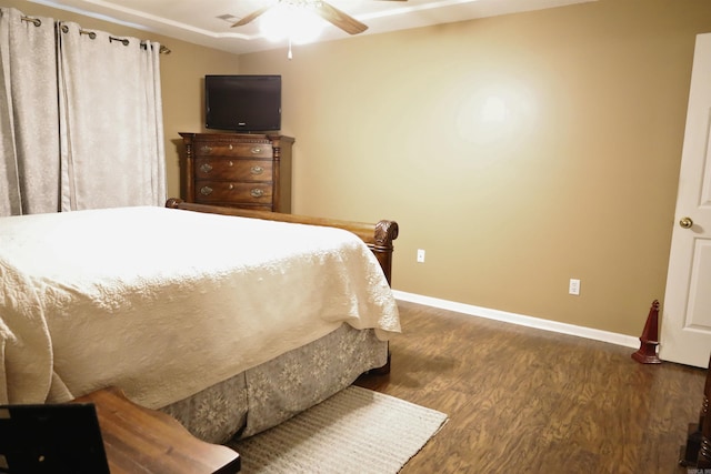 3302 Willow Ln, Paragould, AR 72450 - bedroom with baseboards, ceiling fan, and wood finished floors