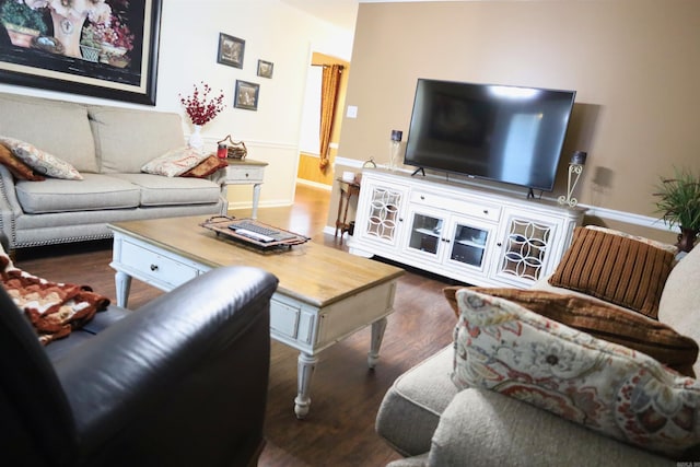 3302 Willow Ln, Paragould, AR 72450 - living room featuring baseboards and wood finished floors