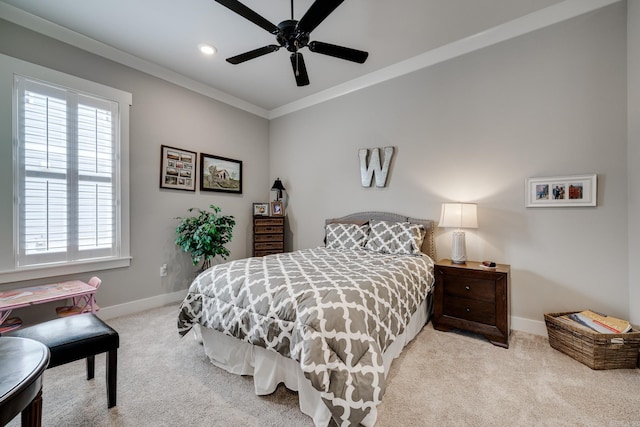 bedroom featuring baseboards, carpet flooring, and multiple windows