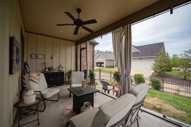 sunroom / solarium with ceiling fan and outdoor lounge area