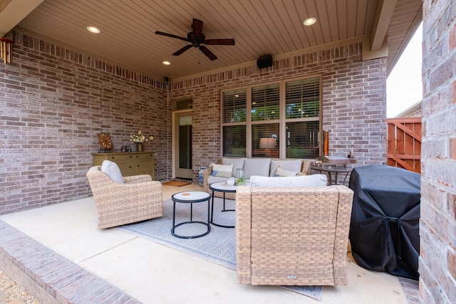 view of patio / terrace with grilling area, outdoor lounge area, and a ceiling fan