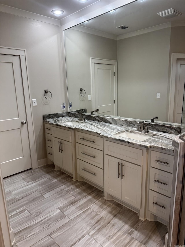 2560 Lilac Dr, Conway, AR 72034 - full bath featuring ornamental molding, double vanity, and baseboards