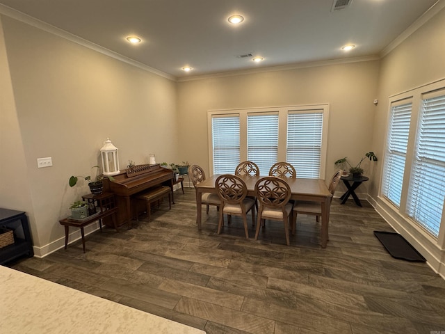 2560 Lilac Dr, Conway, AR 72034 - dining space featuring dark wood-style floors, crown molding, baseboards, and recessed lighting