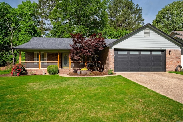 single story home featuring a garage, a front yard, brick siding, concrete driveway, and a porch
