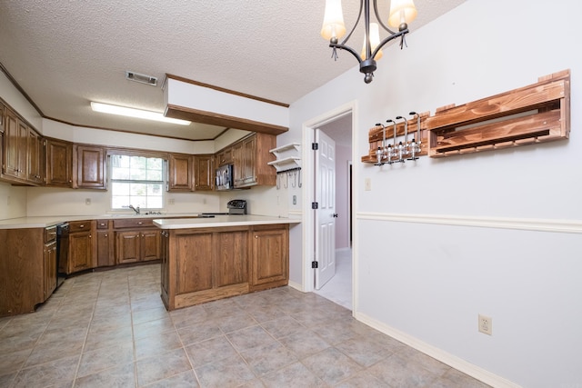 kitchen featuring electric range, a textured ceiling, visible vents, stainless steel microwave, and a peninsula