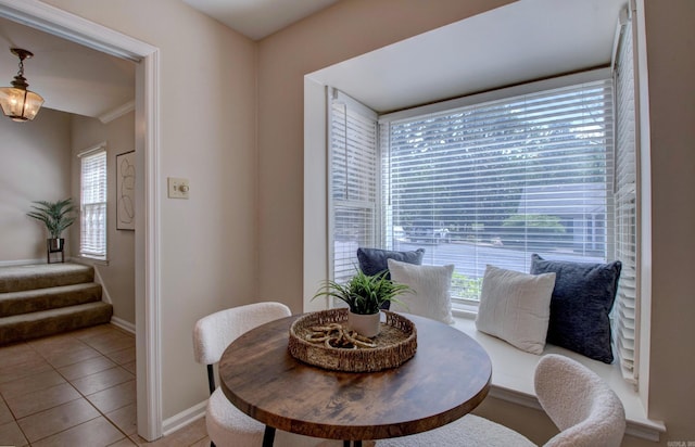 2200 Andover Ct, Little Rock, AR 72227 - dining area with light tile patterned floors, baseboards, and stairs
